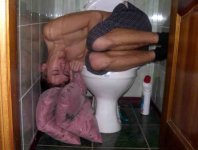 Hugging_toilet.jpeg Hugging_toilet.jpeg